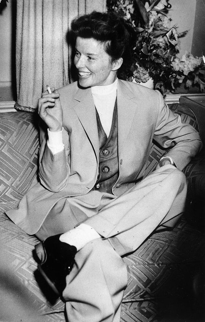 The fashion icon of all time - Katharine Hepburn - wore her fierce and independent personality right over her blazer and trousers. Photo: Getty