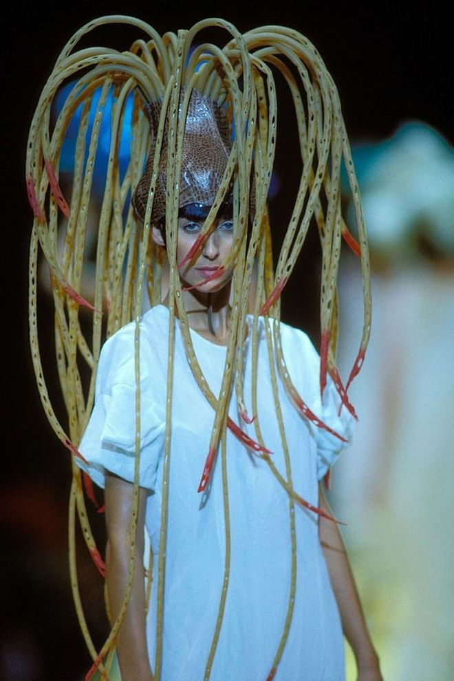 For its 20th anniversary show, the collection was entitled "Ultrasimple" – a tongue-in-cheek description of a wildly extravagant show, including this very special headpiece. Photo: Getty