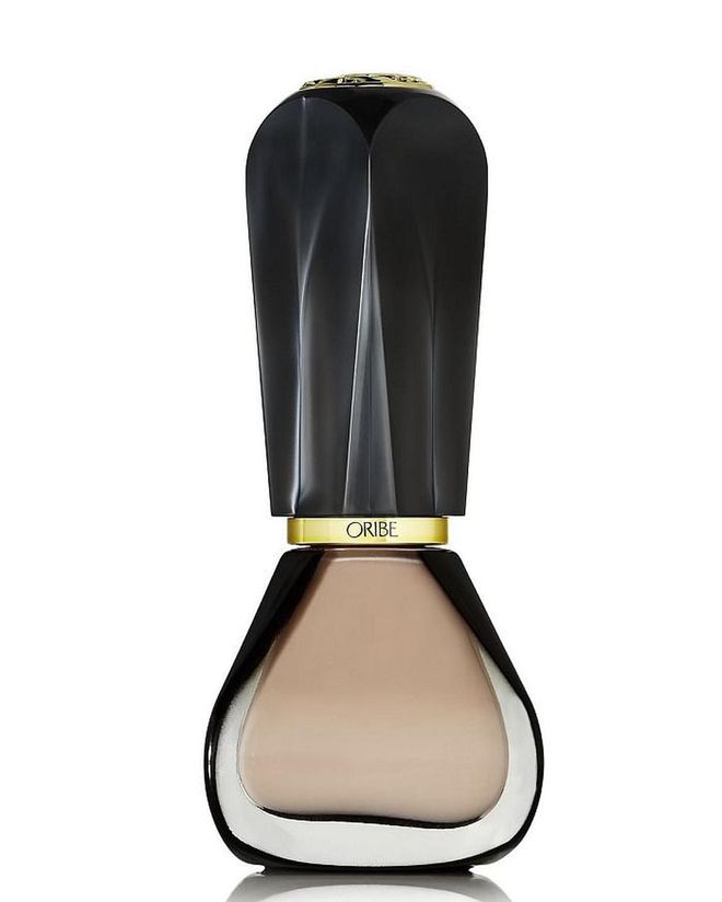 The snazziest nail varnish we've come across in a long time, Oribe's does-what-it-says-on-the-tin varnish is the ultimate cashmere jumper nude shade that looks chic on all skin tones. <b>Oribe The Lacquer High Shine Nail Varnish in The Nude</b>