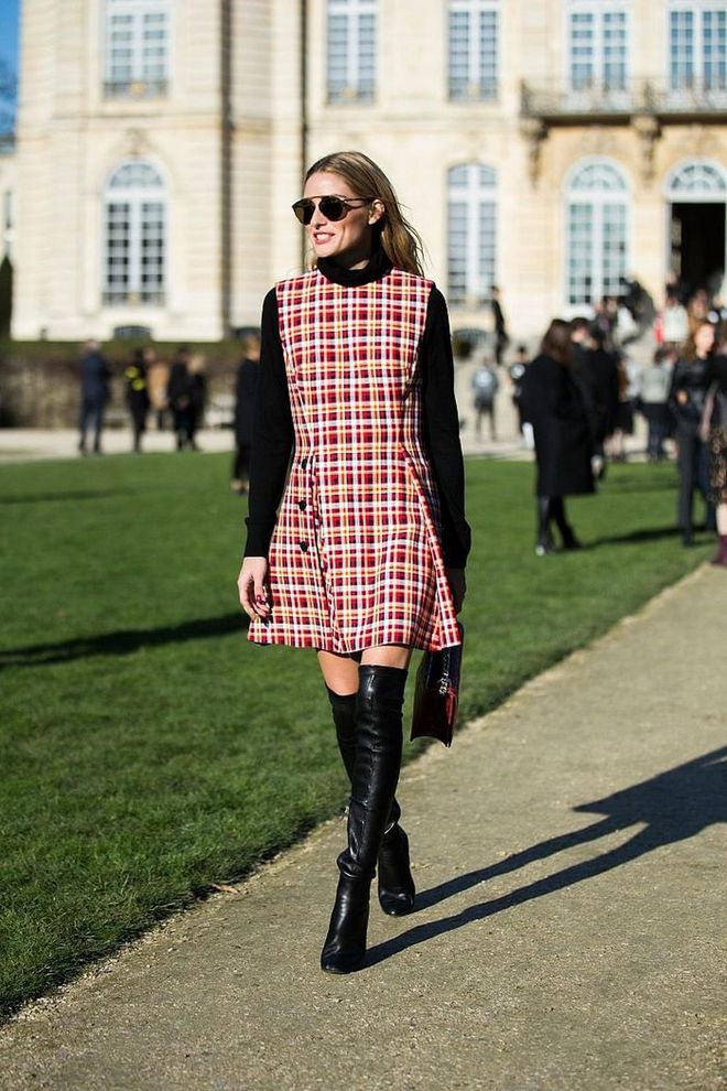 Juxtapose the provocative aesthetic of thigh-highs with a classic, prim shift dress for a chic look. Photo: Getty 