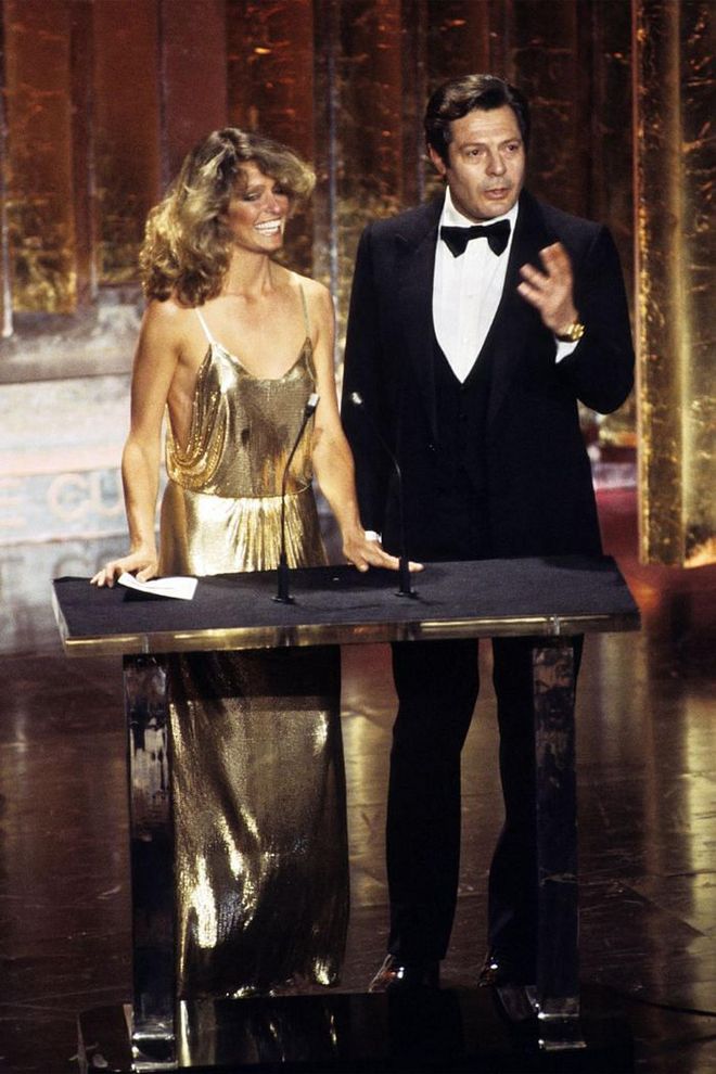 Farrah Fawcett was the golden girl of the ceremony, her gilded Stephen Burrows gown spawned a million replicas for the disco set.