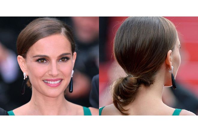 Impeccable makeup and statement earrings provide a glamorous balance to Natalie Portman's understated loop. Photo: Getty