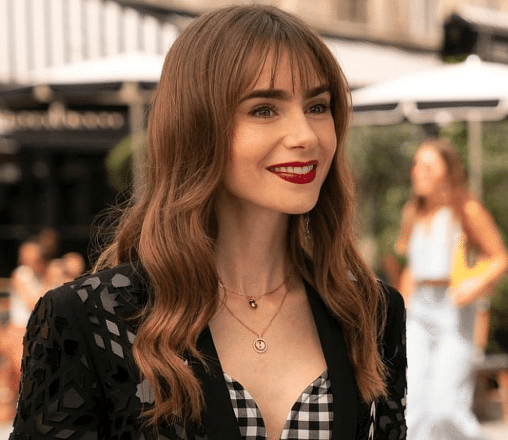 Lily Collins Is A Parisian It Girl In An Elegant Gown Covered In Cutouts