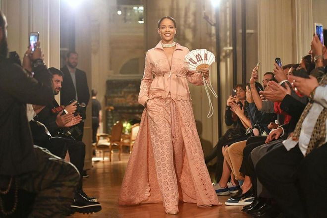 As if Rihanna's Fenty Puma creepers and furry slides didn't dominate 2016 themselves, the singer/designer also headed to Paris to stage her second Puma collection. Making her Paris Fashion Week debut, she unveiled a collection inspired by "Marie Antoinette if she went to the gym" as only Bad Gal Riri could do. For her runway bow, she wore a pink lace suit, pearl choker and Puma fan—reminding us all of her style icon status.