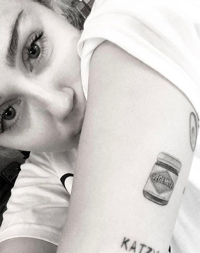 Tattoo artist Dr. Woo shared a picture of Miley Cyrus' tattoo tribute to her Australian love, Liam Hemsworth: A jar of Vegemite. Some fans thought there might have been better ways to honor Liam, but to each their own.