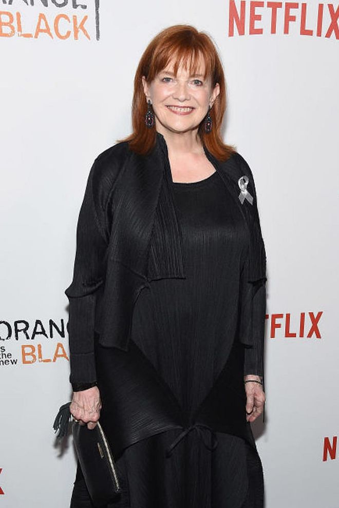 When she's not playing Judy, actress Blair Brown sticks with the red mane, but opts for a sleeker, darker wardrobe instead of an orange jumpsuit.