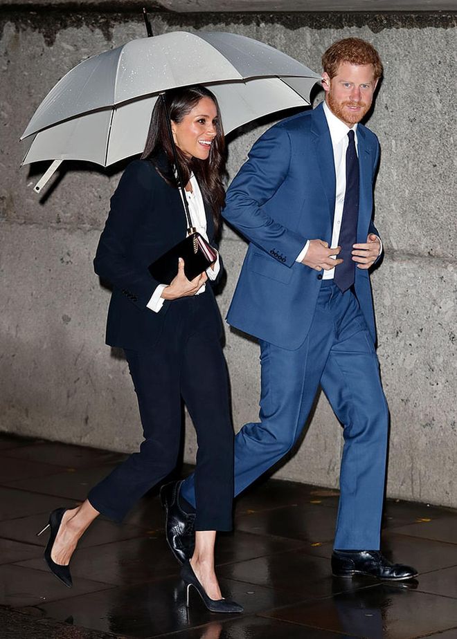 Meghan attended The Endeavour Fund Awards looking like she means business in an uncoventional outfit. She wears an Alexander McQueen black pantsuit with a silk pussy-bow blouse and black Manolo pumps. 