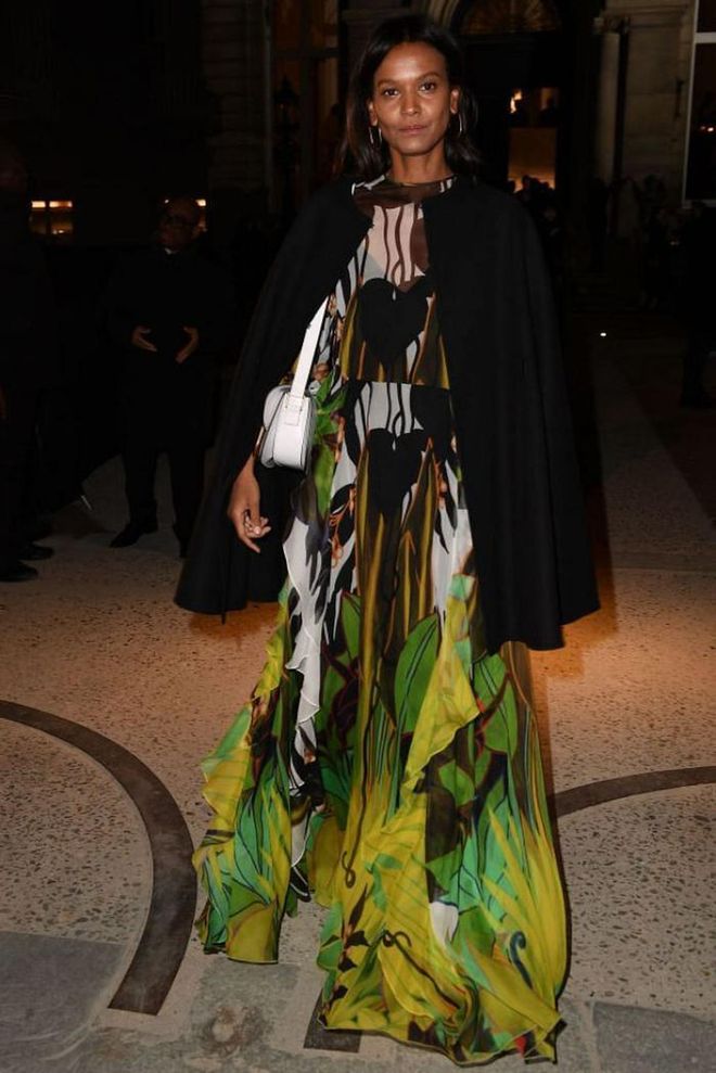 Liya Kebede paired her flowing Valentino gown with a chic cape.