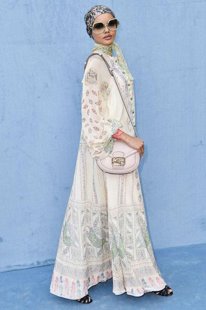 Halima Aden accessorised with a pastel coloured shoulder-bag.

Photo: Jacopo Raule / Getty