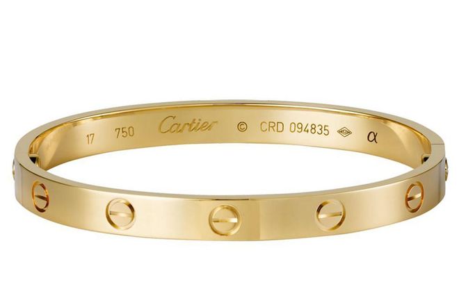 Born in the 70s, Cartier's Love Bracelet is a subtle yet feminine jewellery piece that never upstages an outfit, adding an understated elegance. Photo: Getty