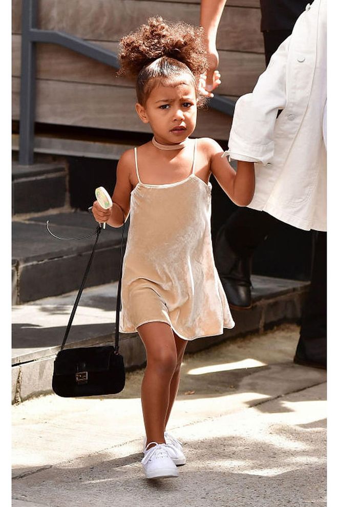 While out with mom Kim Kardashian in New York City, North gave every '90s style lover envy in this velvet slip dress and choker. 