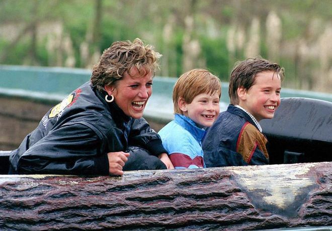 Diana, William, and Harry are all smiles as they ride an amusement park ride at Thorpe Park.
Photo: Getty 