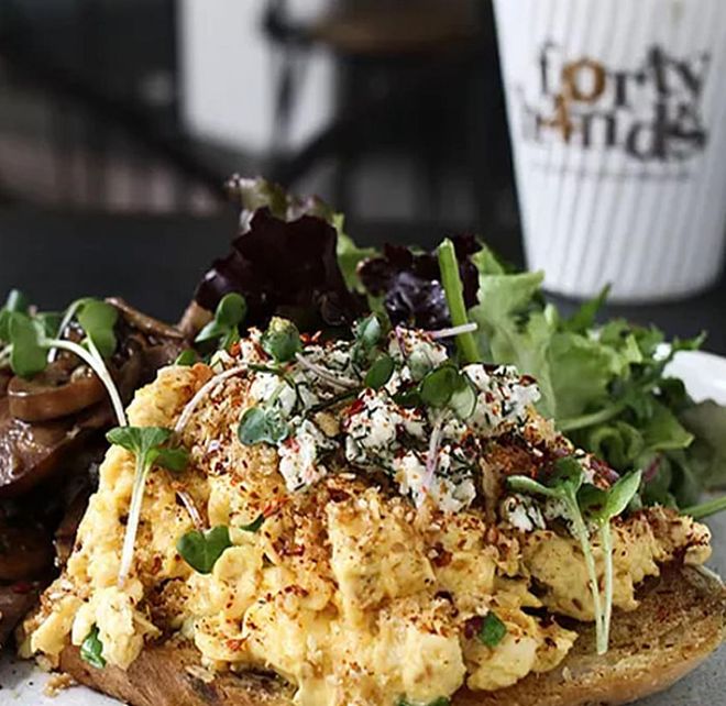 On Saturdays and Sundays, expect the crowd to be at peak capacity. Among the horde, it's hard to tell who's who unless you sit all the way inside. Nevertheless, enjoy the atmosphere as you will fall in love with their eggs cocotte, Coachella crab fries and coffee. 
Photo: Forty Hands 