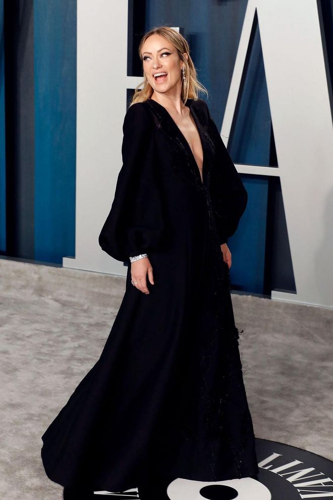 In a black Fendi gown with a plunging neckline. Photo: Getty