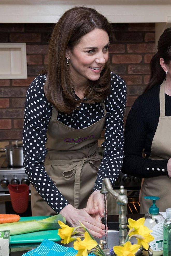 Kate wore a polka-dot blouse from Equipment during her trip to Savannah House.

Photo: Getty