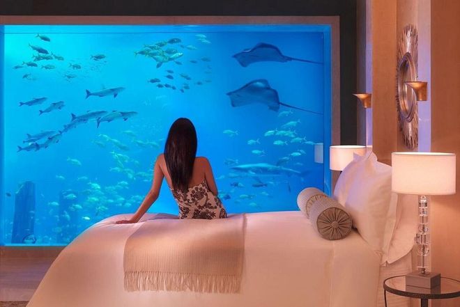 As if sleeping in a fishbowl, the Underwater Suites at Dubai’s Atlantis, the Palm, peer into a man-made ecosystem through floor-to-ceiling windows. The lagoon teems with 65,000 marine inhabitants, from stingrays to schools of fish. The one thing the resort can’t guarantee is privacy—sharks have eyes too, after all. Photo: Atlantis, The Palm