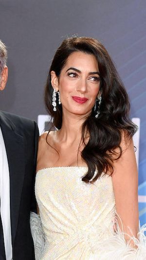 George Clooney and Amal Clooney attend "The Tender Bar" Premiere during the 65th BFI London Film Festival at The Royal Festival Hall. (Photo: Karwai Tang/Getty Images)