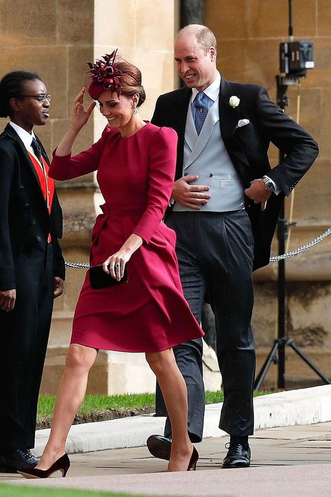 Prince Harry and Kate Middleton, wearing a fuchsia Alexander McQueen dress, arriving to the chapel.