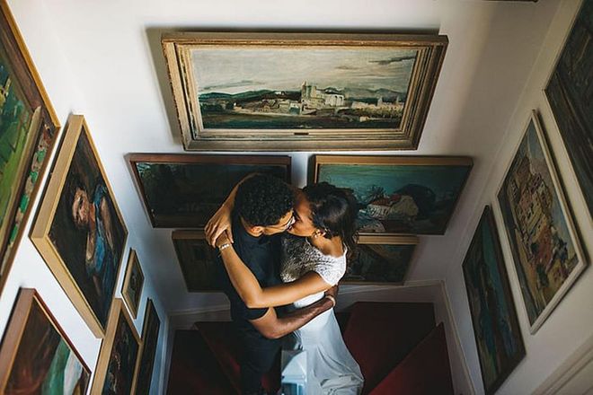 The wedding of a French basketball player and an Orlando Magic dancer was held in a private home, owned by the son of the late painter Robert Wehrlin. With walls of paintings and sketches, it's almost like getting married in a museum.

Via Rudy &amp; Marta Photography

