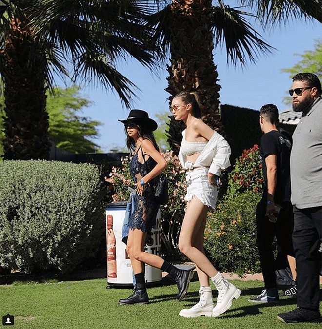 Gigi Hadid skipped the cowboy boots, sandals and trainers in favor of white lug sole boots with attitude—paired with a She Made Me swim suit and white shorts.

Shop it: Both boots, $408, farfetch.com.