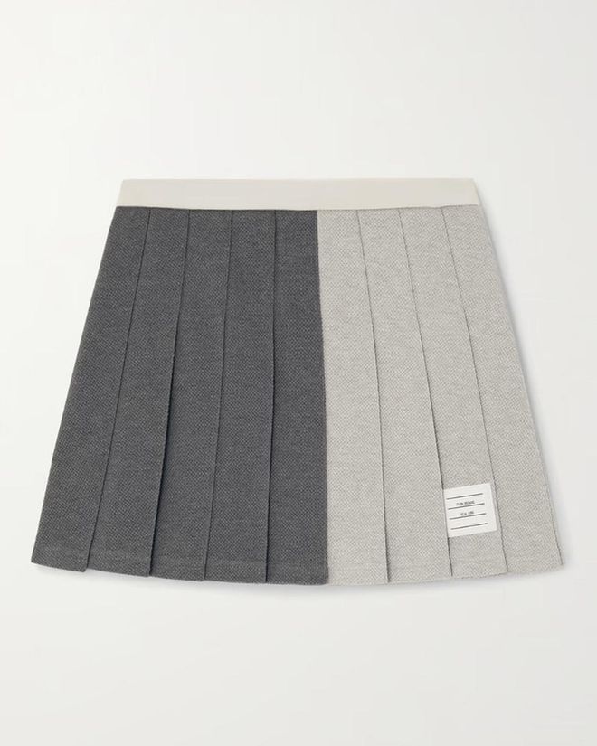  Thom Browne Pleated Color-Block Cotton-Piqué Mini Skirt
Photo: NET-A-PORTER
