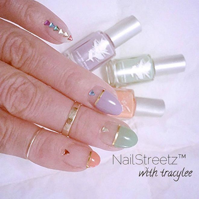 Choose your favorite coordinating pastels (no more than three shades, please) and ask your manicurist for varied lengths of the color separated from the rest of the nail with a thin gold bar. Nail gems, optional.
@nailstreetz
