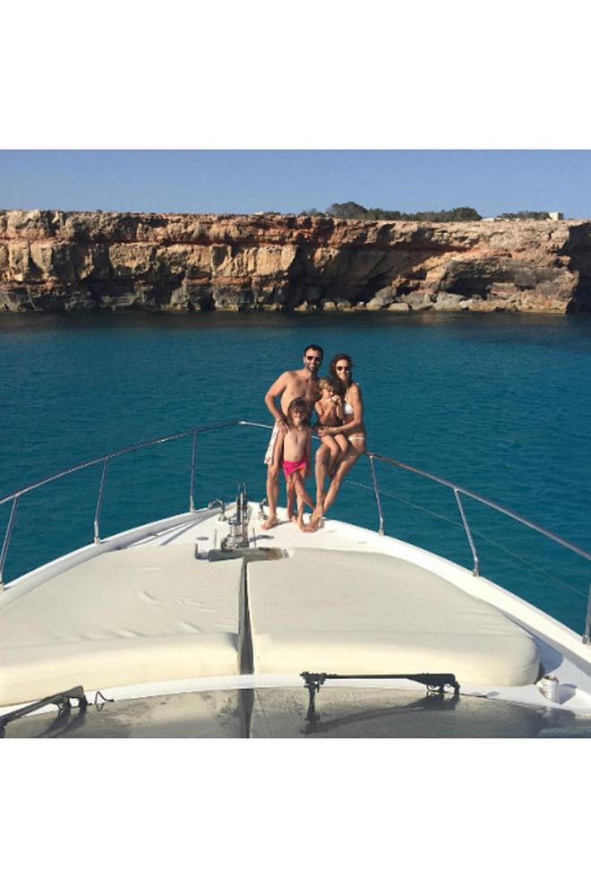 The VS Angel vacations in Ibiza with her family, snapping an Insta aboard a yacht sailing the coast. Photo: Instagram