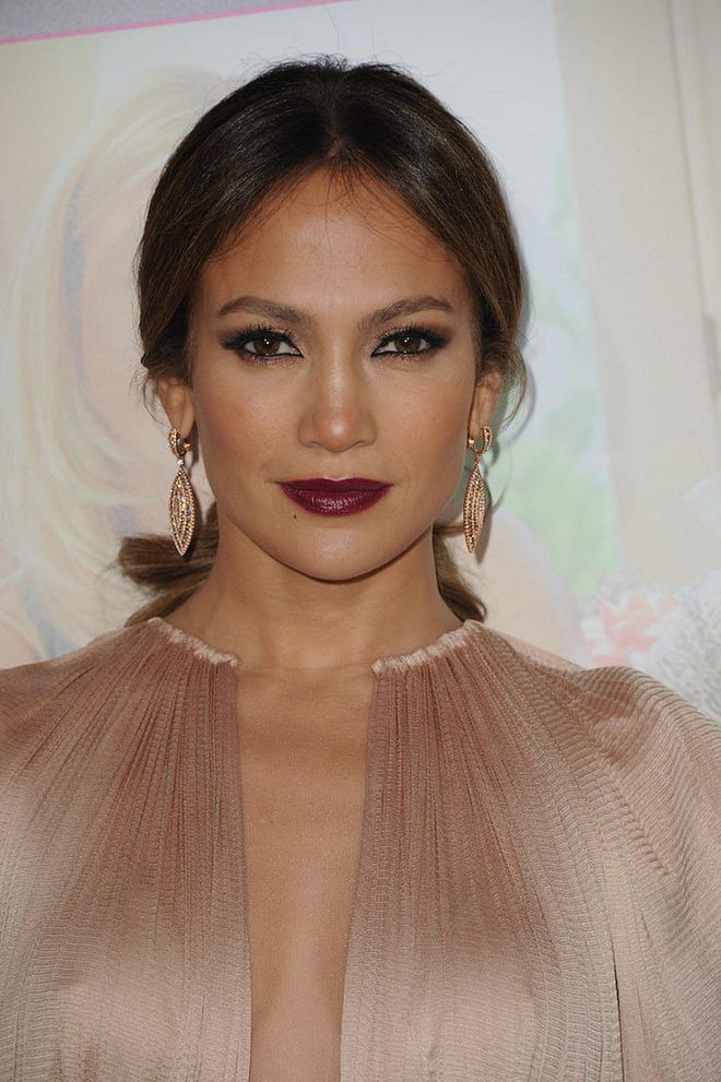 A departure from her typical beauty look, this plum lipstick and catty black eyeliner looked gorgeous at a movie premiere in 2012.