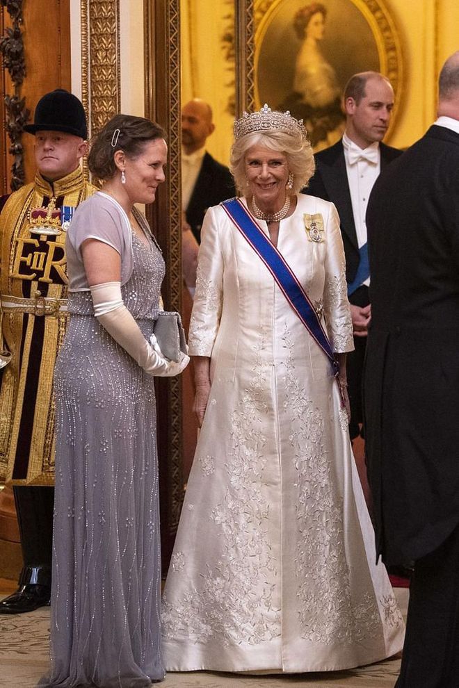 Camilla, Duchess of Cornwall, wears a cream embroidered gown by Bruce Oldfield and the Boucheron tiara.

Photo: Getty