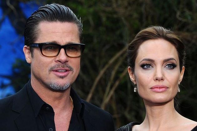 Brad Pitt and Angelina Jolie (Photo: Anthony Harvey/Getty Images)