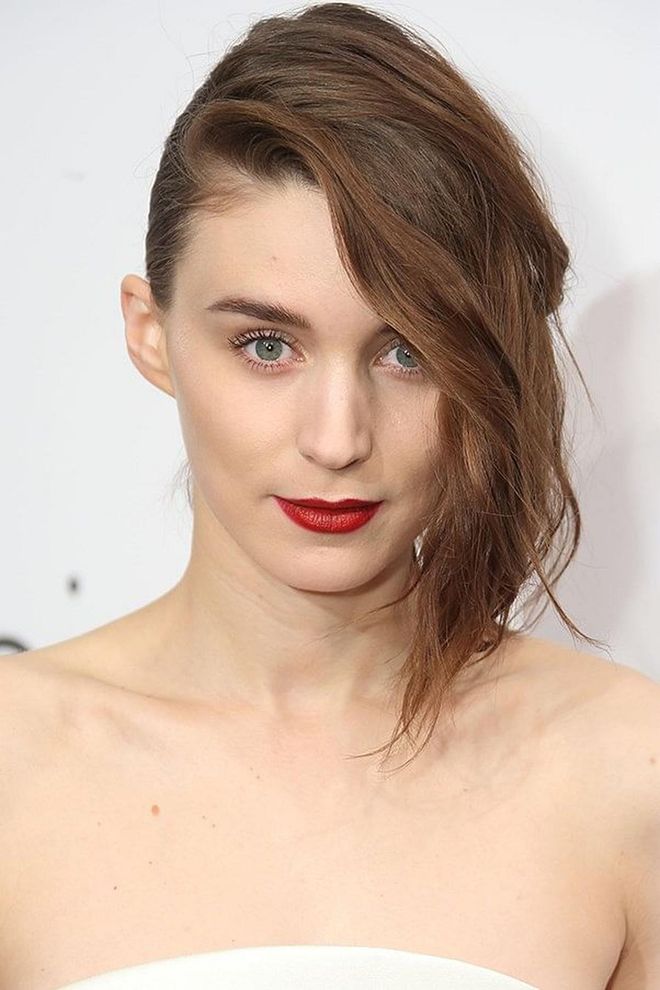 Leave out an exaggerated swoop of hair from an updo for a faux-fringe look like Rooney Mara’s, minus the commitment.