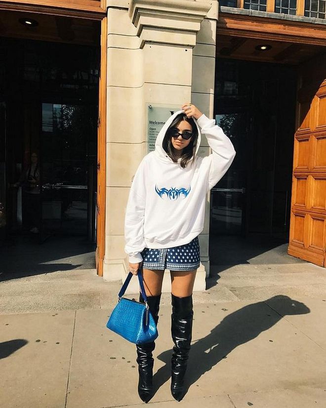 Dua visited the Pink Floyd exhibition in London while dressed in this cute ensemble of a MISBHV hoodie, Isabel Marant wrap skirt and thigh-high Saint Laurent boots. What really stands out though, is her Marques'almeida tote, which is really pretty and sold out. 
Photo: Instagram
