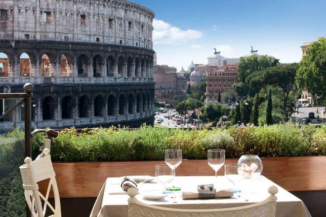 Avoid the crowds and sit high above the Roman ruins, with a spectacular scene of the ancient Colosseum. Aroma's Michelin-starred menu rivals its spectacular view—with options like white truffle ravioli or salmon with pureed fennel. Photo: Aroma