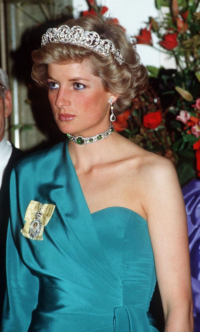 Originally gifted to Queen Mary by the Ladies of India in 1911, this daring emerald choker was given to Diana on a lifetime loan by Queen Elizabeth II shortly after her wedding to Charles. Though it was returned to the Queen's collection after Diana's death, Her Majesty could choose to allot it to Meghan in a similar arrangement. (This one isn't technically Harry's to give, but we think it would make a particularly beautiful piece for Meghan.)
Photo: Getty 