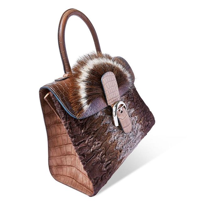 Founded in 1829 and touted as one of the world’s oldest fine leather goods houses, Delvaux specialises in high-quality structured bags, the use of exotic leathers and the fusing of time-honoured techniques with contemporary design. The must-have this season? The handcrafted, architectural Brillant MM Wild Beast in Astrakhan and Alligator. A spin on one of the brand’s most iconic bags, this beauty is a definite head-turner.
