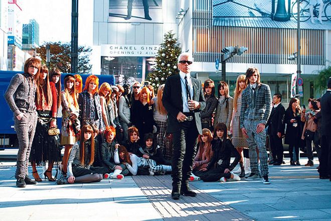 Lagerfeld and models outside the Ginza store