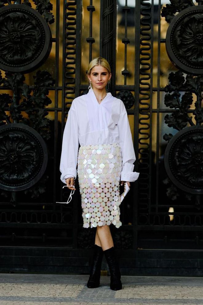 Take note from Caroline Daur and mix a party skirt with a smart blouse.