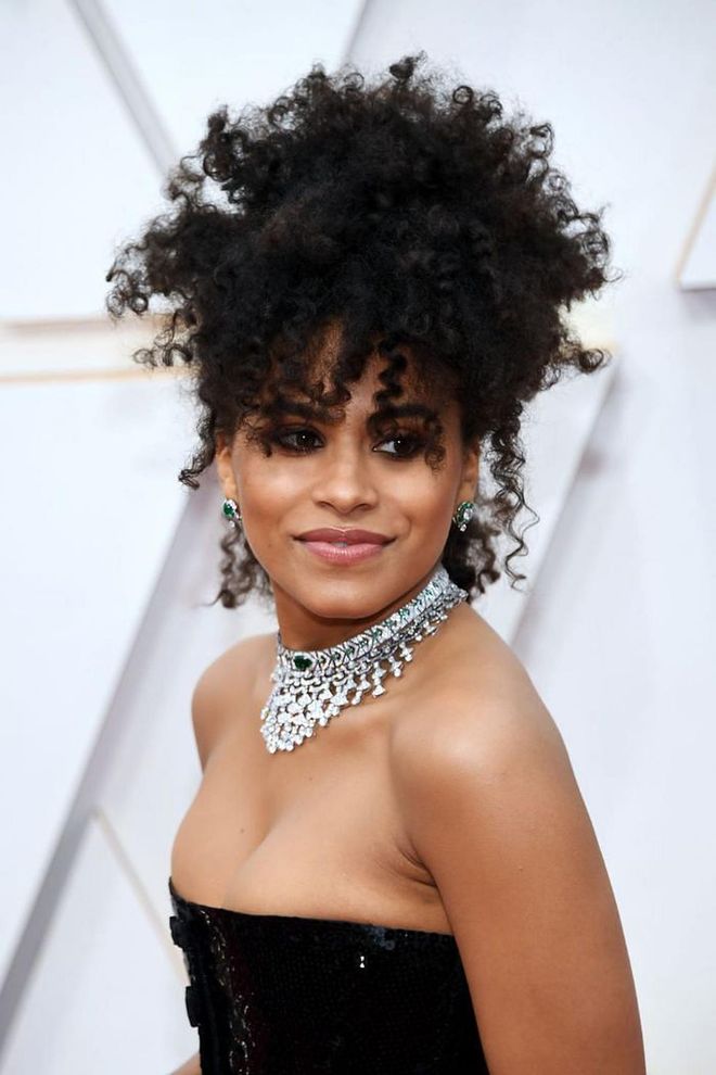 The German actress wore a killer combination of voluminous curls and icy jewelry and paired the look with sultry smoky eyeliner.

Photo: Kevin Mazur / Getty