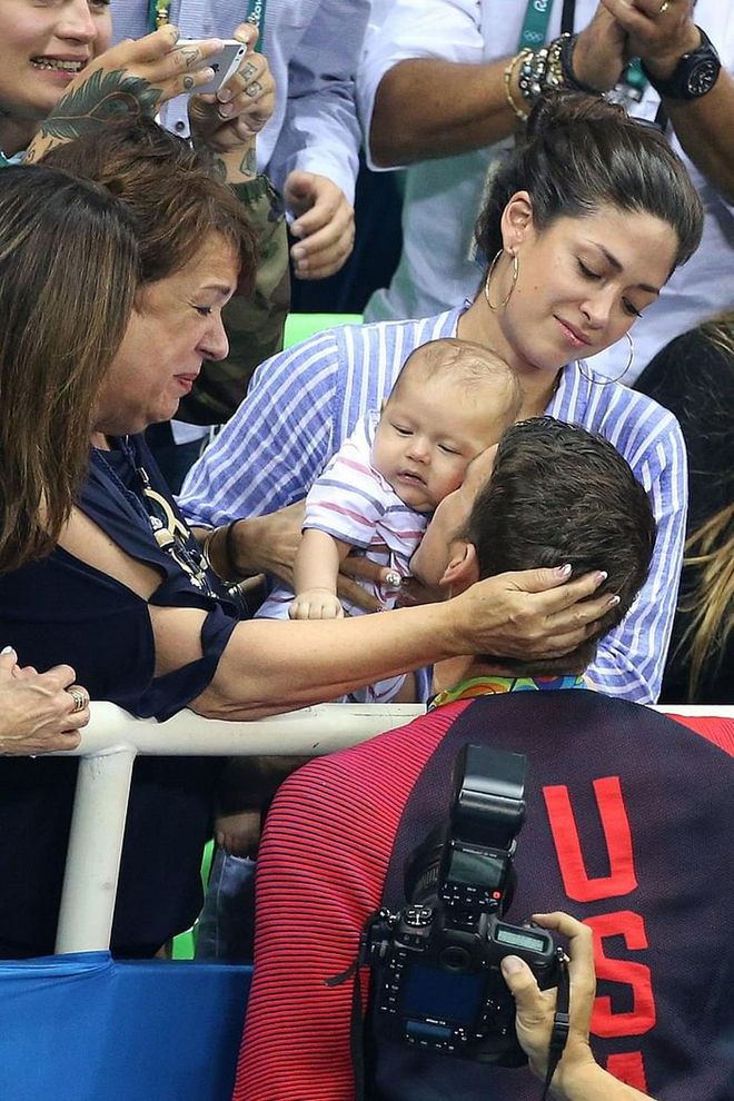 The swimmer Michael Phelps' three-month-old son Boomer was at the Rio Olympic Games supporting his father.