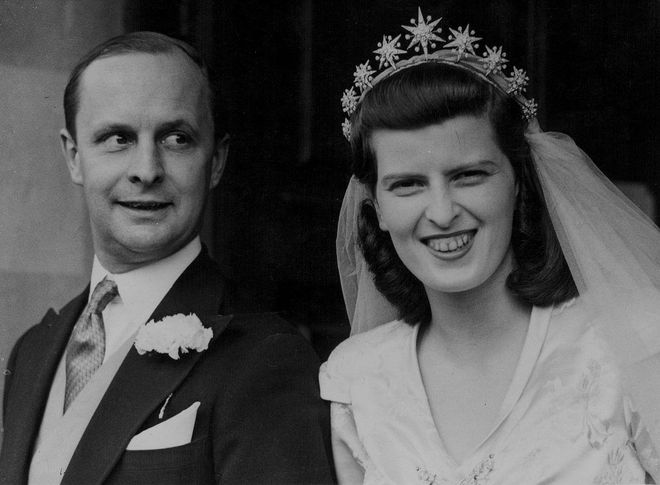 William Waldorf Astor married socialite Sarah Norton in 1945. Despite getting divorced in 1953, the pair had a whirlwind romance and apparently got engaged just a few days after they met. Not much is publicly known about Sarah's dress, but we can all agree that her starburst tiara is fit for royalty.

(Side note: This wedding took place in London, but the Astors are a cross-continental fixture, as anyone who's walked into New York's Waldorf Astoria knows). Photo: Getty 