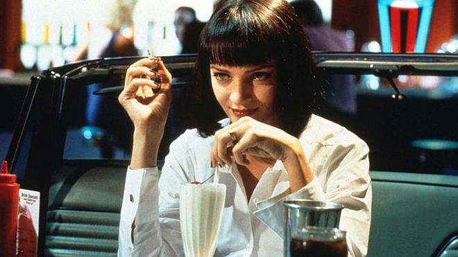 Though simple and classic, Mia Wallace's execution of a crisp white button-down, black pants, and blunt bob was impeccable—and remain recognizable to this day.

Photo: Getty