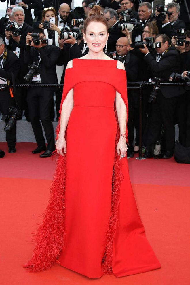 8 May: Julianne Moore went vibrant in red with this Givenchy feathered cape gown.

Photo: Getty