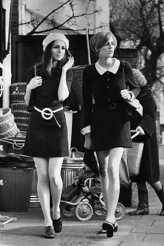 Two young girls embrace the mod look while shopping in London. Photo: Getty 