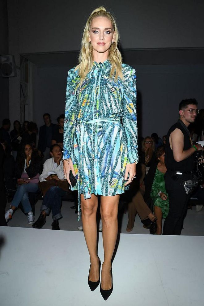 Chiara Ferragni sat front row for the show in a blue patterned mini-dress. 

Photo: Getty