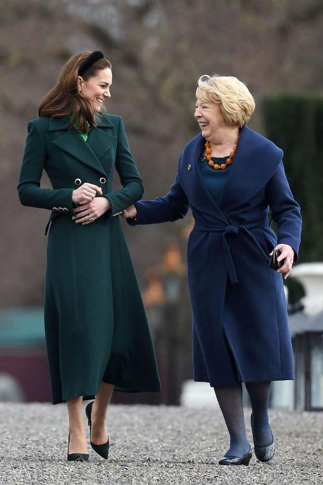 Kate laughs with Sabina Coye.

Photo: Getty