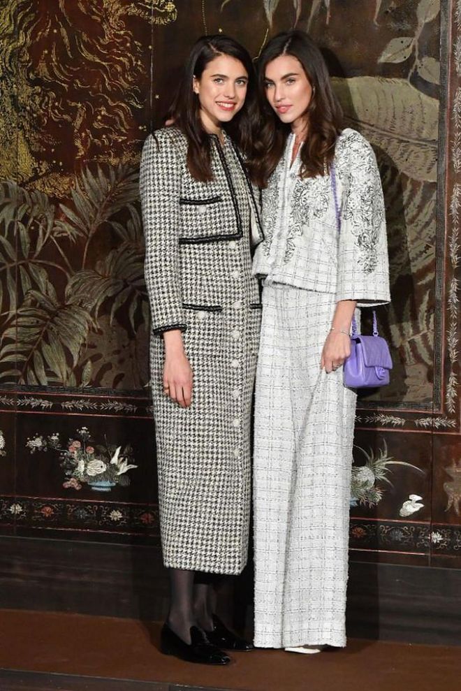 Sisters Rainey and Margaret Qualley in different tweed ensembles.

Photo: Getty