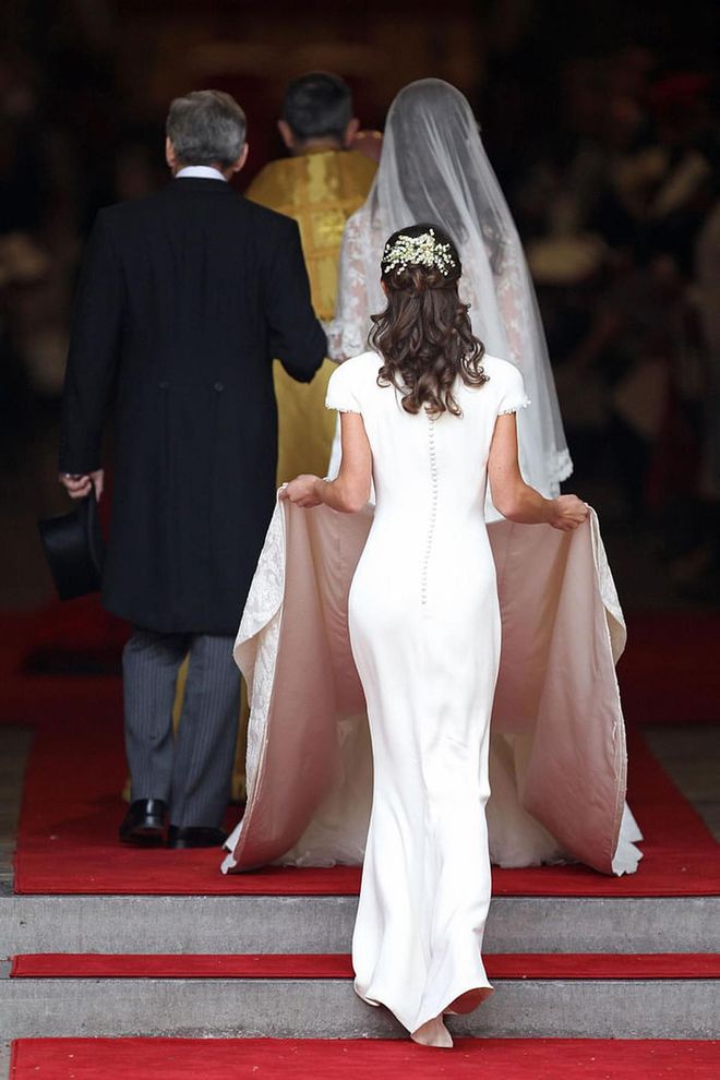 "I think the plan was not really for it to be a significant dress. Really just to sort of blend in with the train," Pippa said in 2014. "I suppose it's flattering, embarrassing, definitely. It wasn't planned."