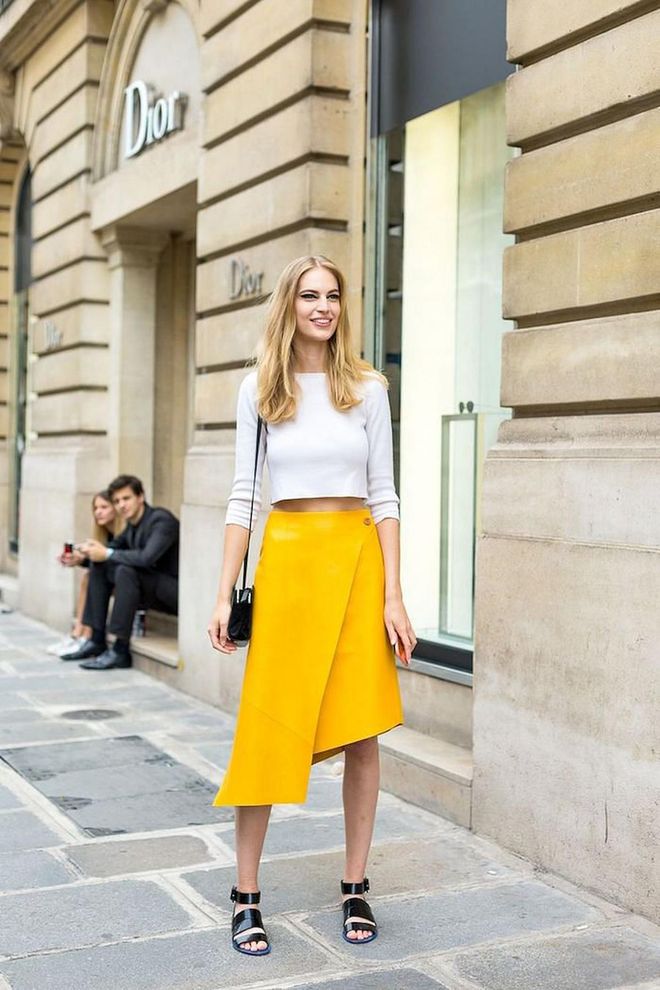 Add one of summer's biggest color trends, vibrant yellow, into your wardrobe in the form of an eye-catching skirt.

Photo: Diego Zuko
