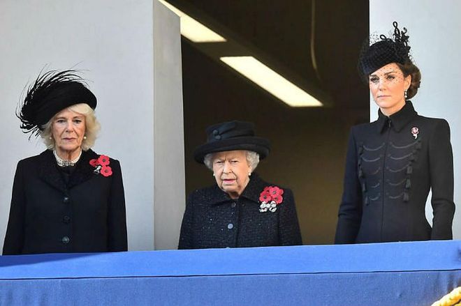 The queen is joined by Camilla, Duchess of Cornwall, and Kate Middleton, on the balcony to observe the Remembrance Sunday service.

Photo: Getty
