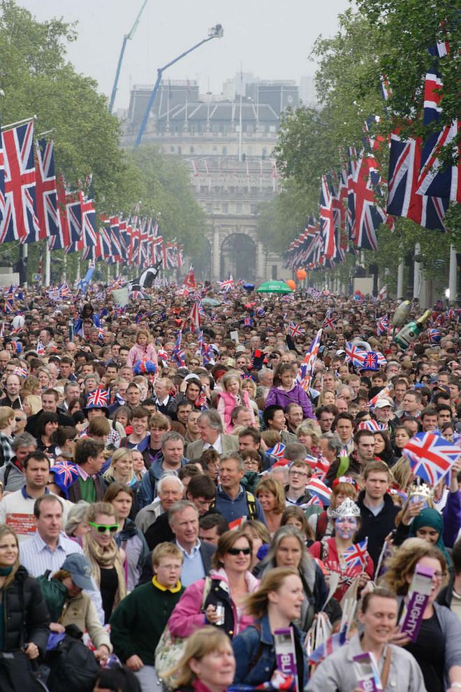 Thousands of adoring fans line the route outside of Westminster Abbey.
Photo: Getty
